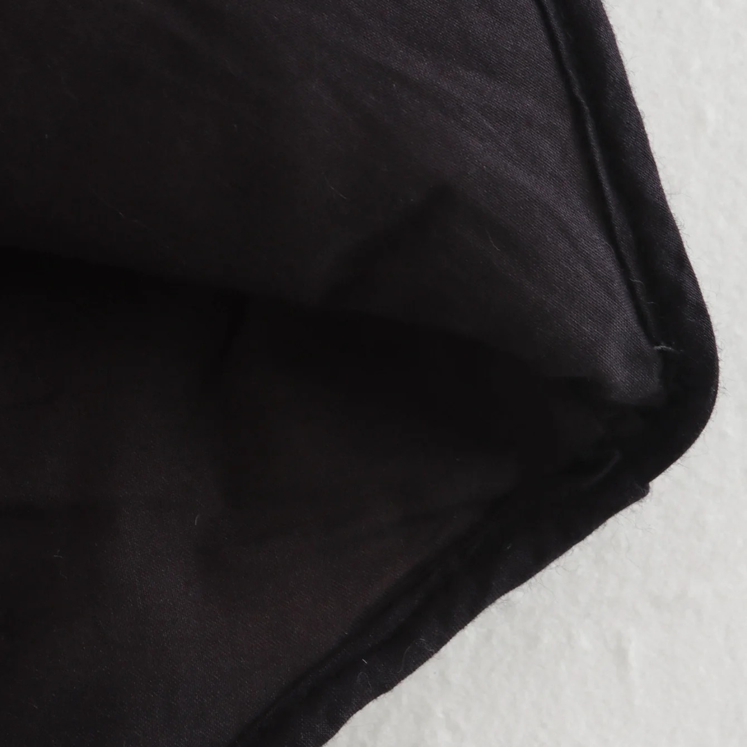Black fabric corner.