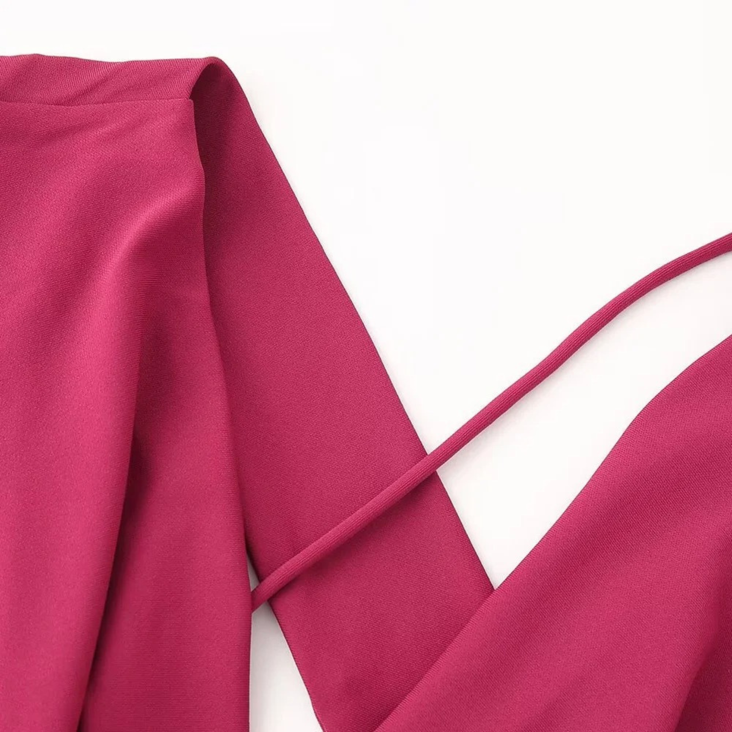 Magenta fabric garment.
