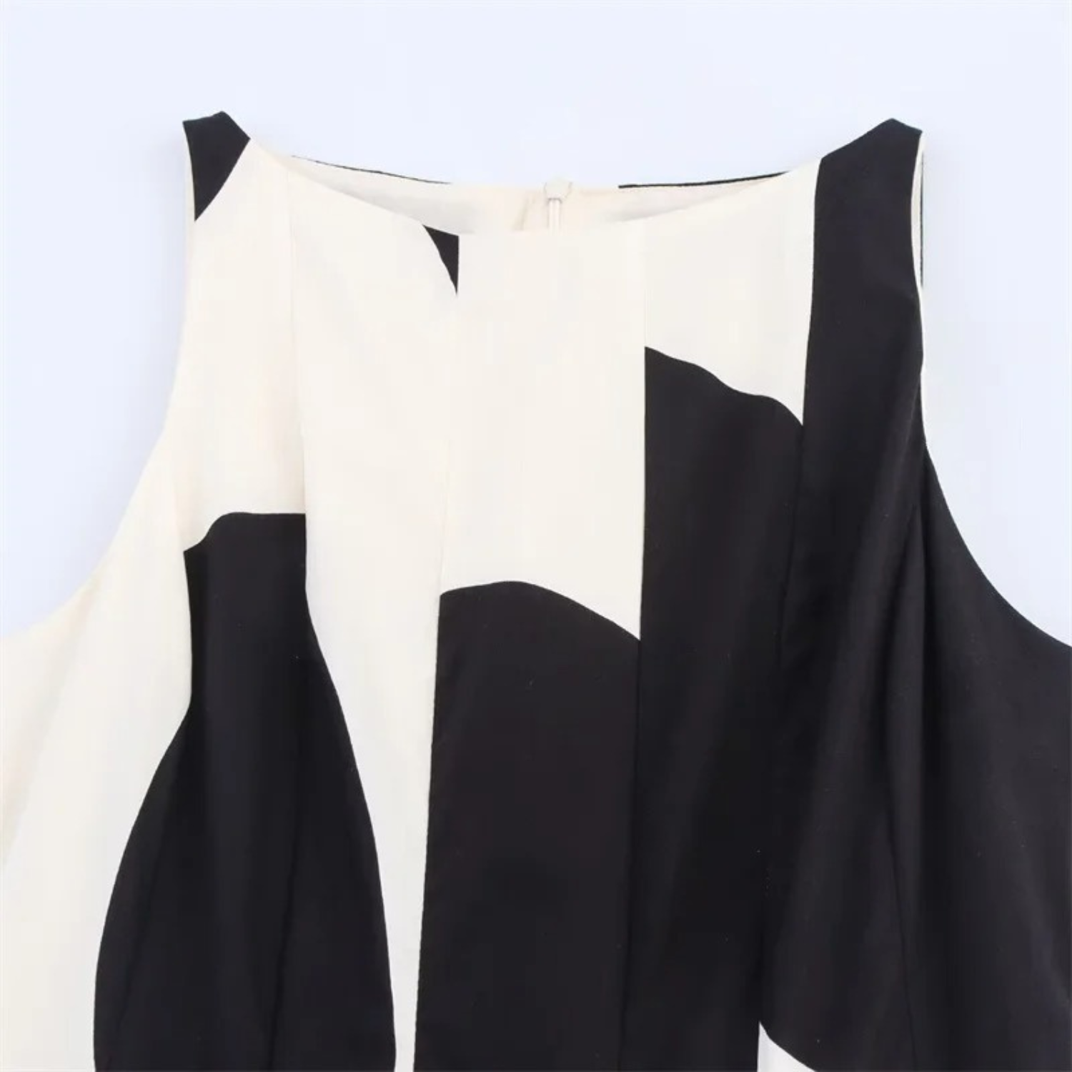Black and white patterned dress.