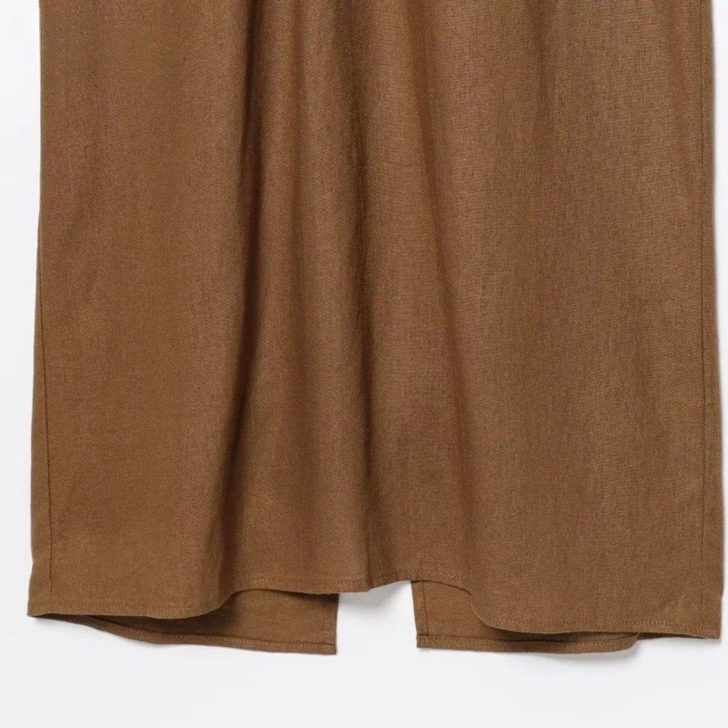 Brown linen garment.