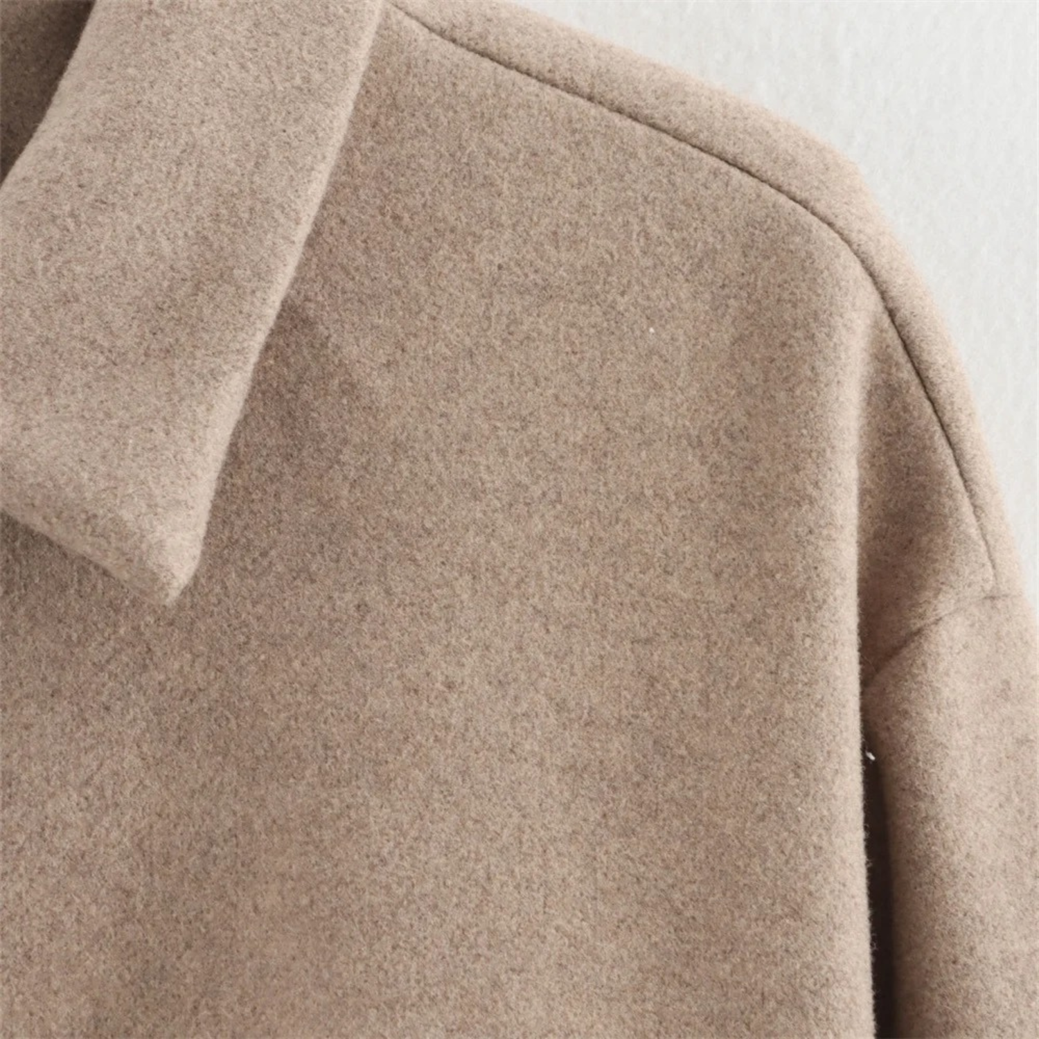 Beige wool coat.